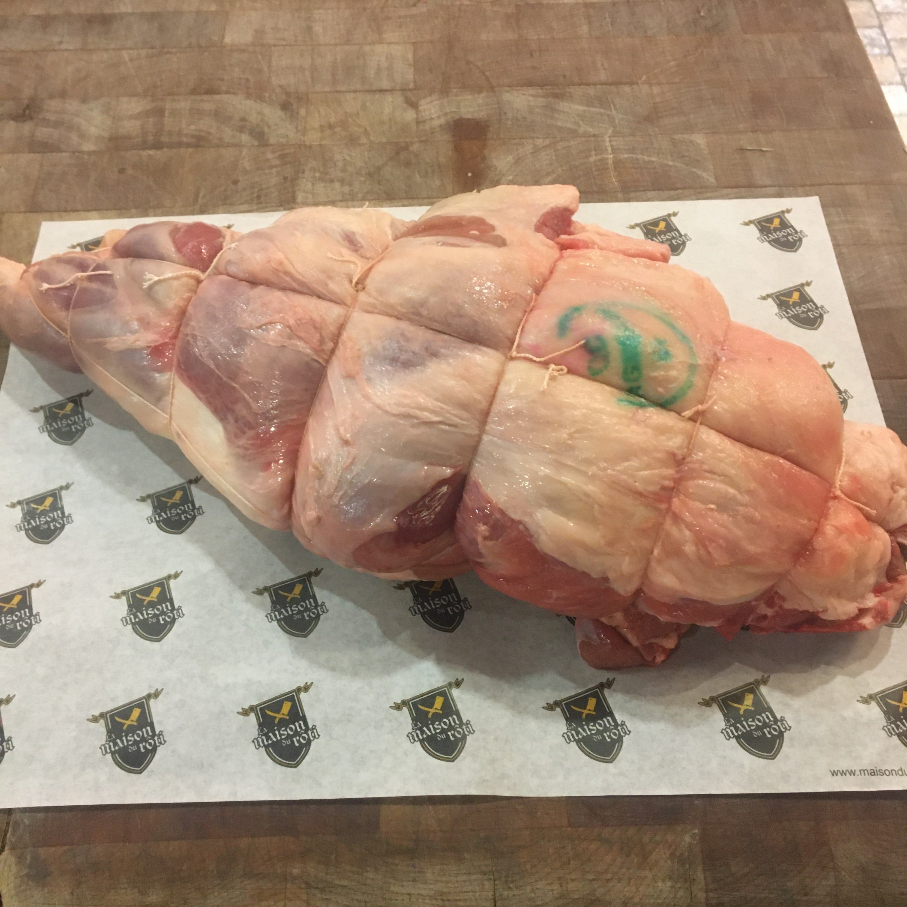Half Quebec lamb leg marinated with garlic and rosemary